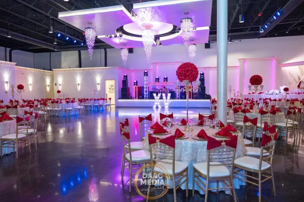 Elegant entertainment stage positioned front and center in a luxurious ballroom, featuring state-of-the-art lighting and sound for captivating performances at any event.