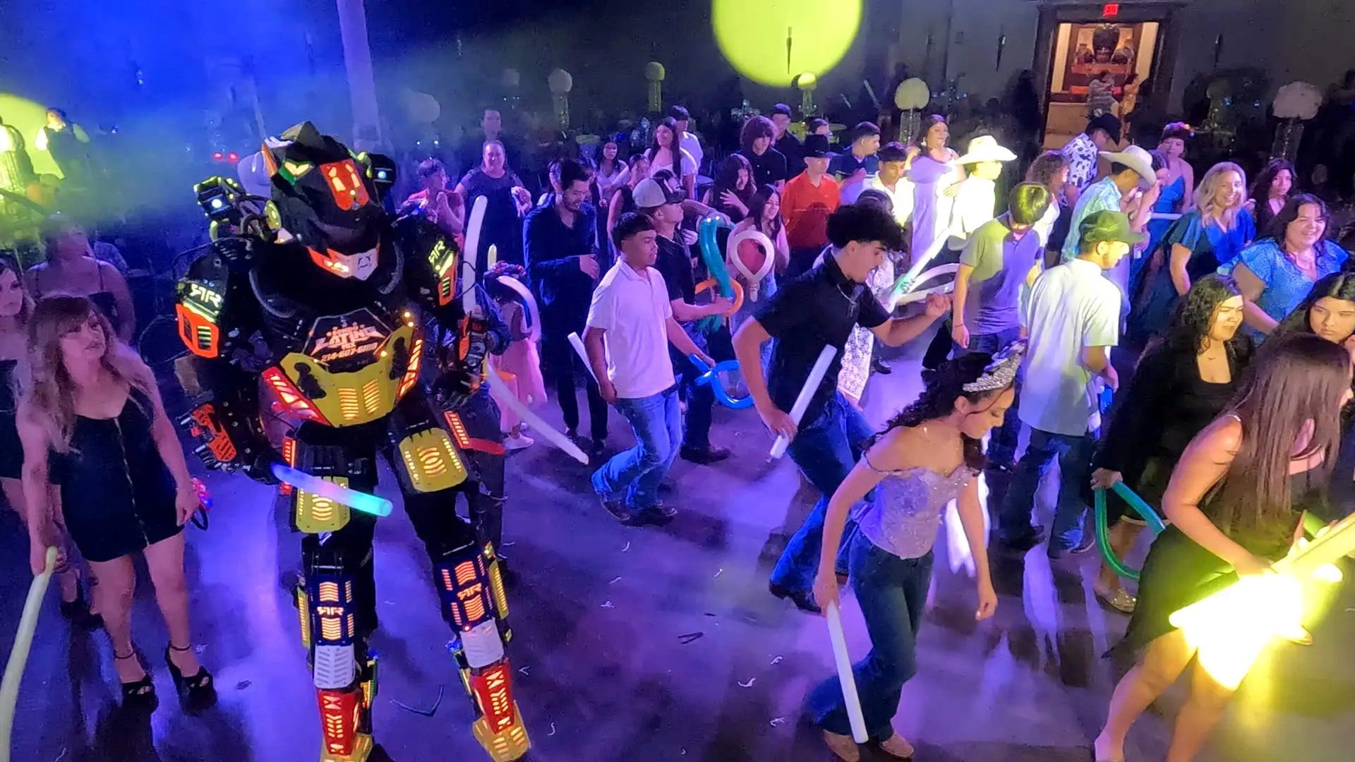 Banquet Halls full of people dancing for a wedding