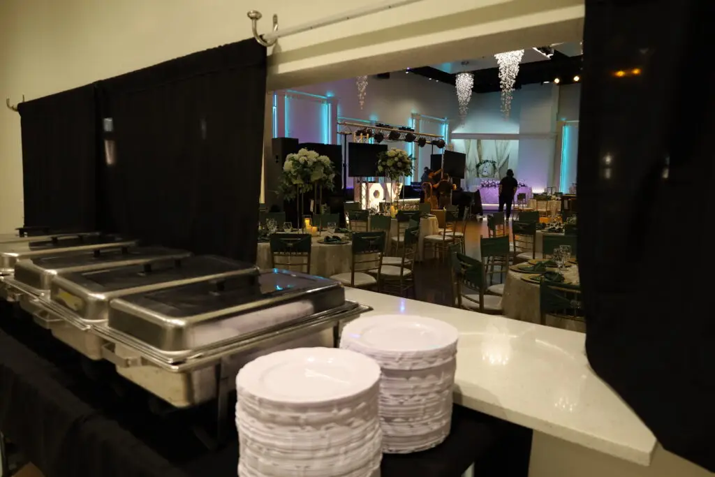 Wedding Reception, Wedding Venue, Full Bar, Amenities, Bride & Groom, Green and Gold color scheme, Tall centerpieces, white and cream flowers