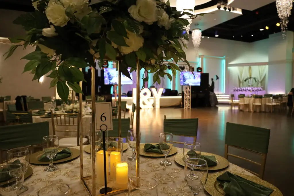 Wedding Reception, Wedding Venue, Full Bar, Amenities, Bride & Groom, Green and Gold color scheme, Tall centerpieces, white and cream flowers